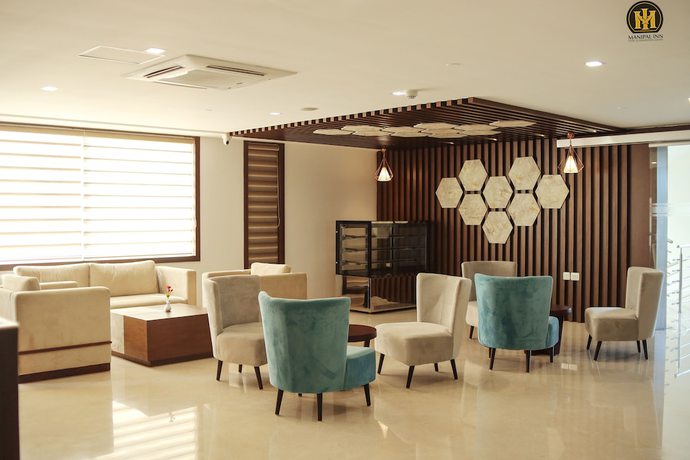 Imagen del bar/restaurante del Hotel Manipal Inn. Foto 6