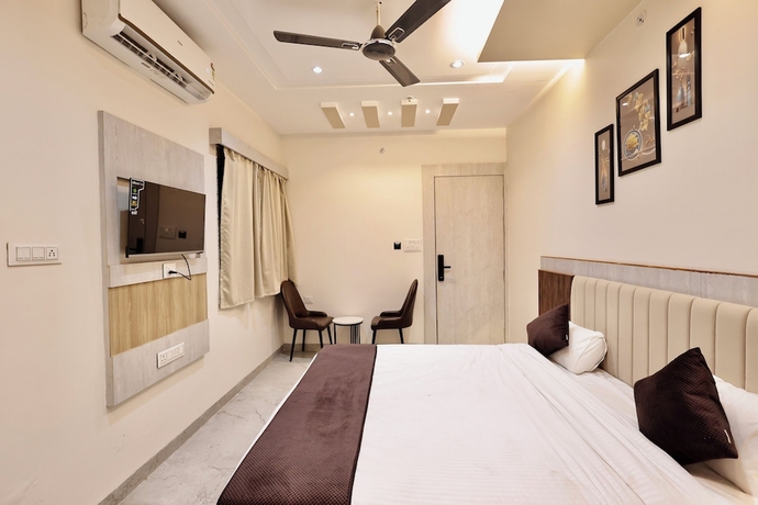 Imagen de la habitación del Hotel Maniratna Premium. Foto 2