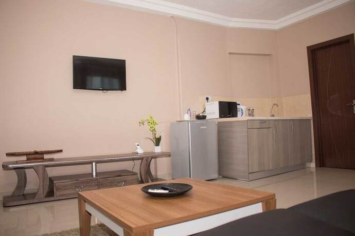 Imagen de la habitación del Hotel Manjaro Suites. Foto 11