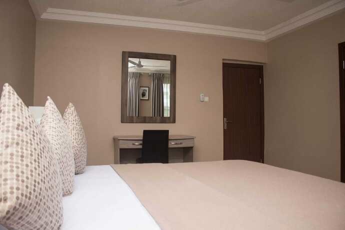 Imagen de la habitación del Hotel Manjaro Suites. Foto 12