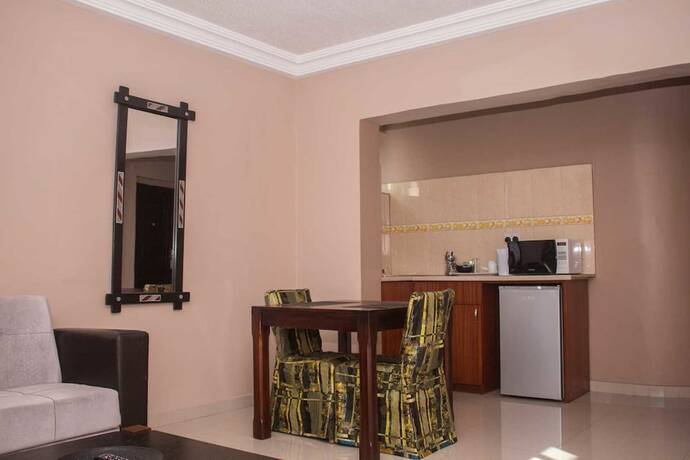 Imagen de la habitación del Hotel Manjaro Suites. Foto 14