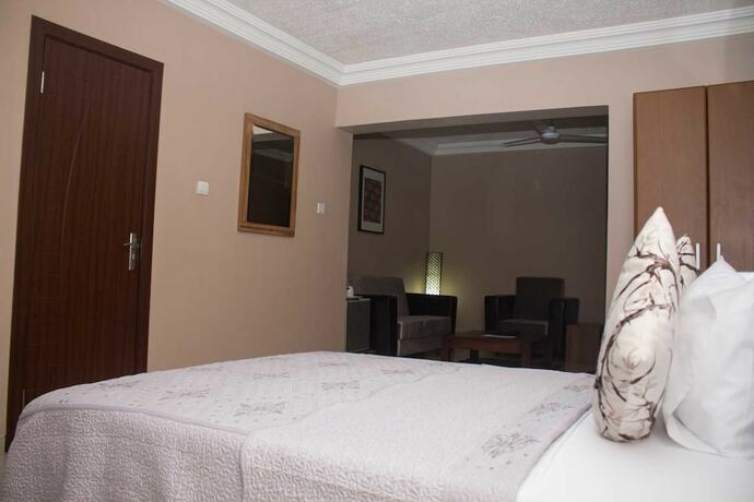 Imagen de la habitación del Hotel Manjaro Suites. Foto 15
