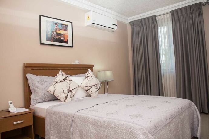 Imagen de la habitación del Hotel Manjaro Suites. Foto 17