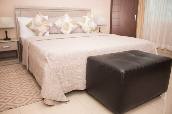 Imagen de la habitación del Hotel Manjaro Suites. Foto 18