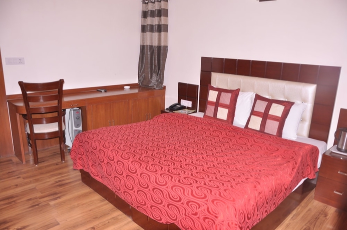 Imagen de la habitación del Hotel Manla Homes Resort. Foto 3