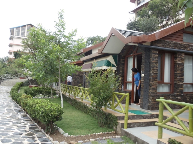 Imagen de la habitación del Hotel Manla Homes Resort. Foto 4