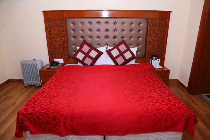 Imagen de la habitación del Hotel Manla Homes Resort. Foto 5