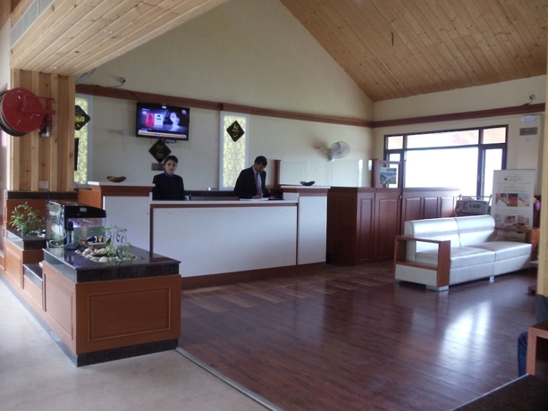 Imagen de los interiores del Hotel Manla Homes Resort. Foto 18