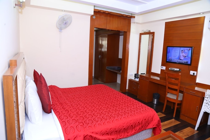 Imagen de la habitación del Hotel Manla Homes Resort. Foto 13