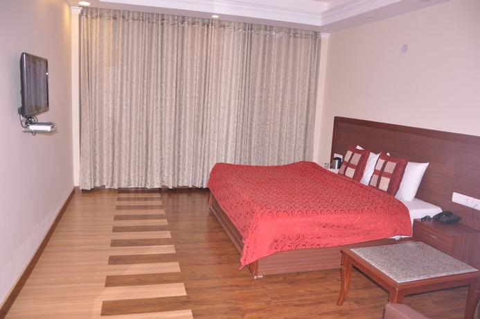 Imagen de la habitación del Hotel Manla Homes Resort. Foto 16