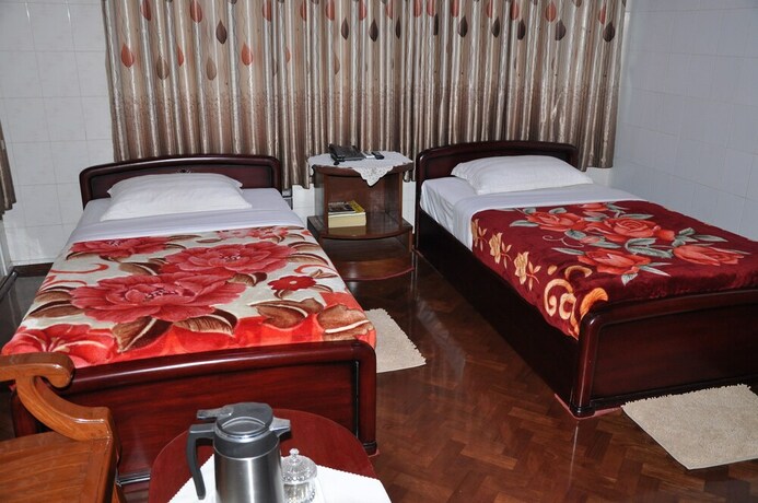 Imagen de la habitación del Hotel Mann Myanmar Inn. Foto 5