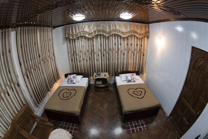 Imagen de la habitación del Hotel Mann Myanmar Inn. Foto 8