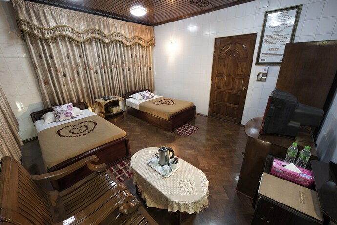 Imagen de la habitación del Hotel Mann Myanmar Inn. Foto 17