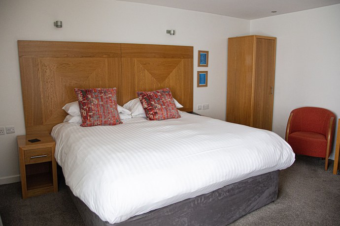 Imagen de la habitación del Hotel Mannings. Foto 19