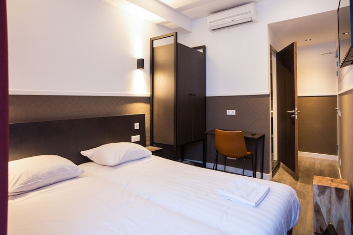 Imagen de la habitación del Hotel Manofa. Foto 14