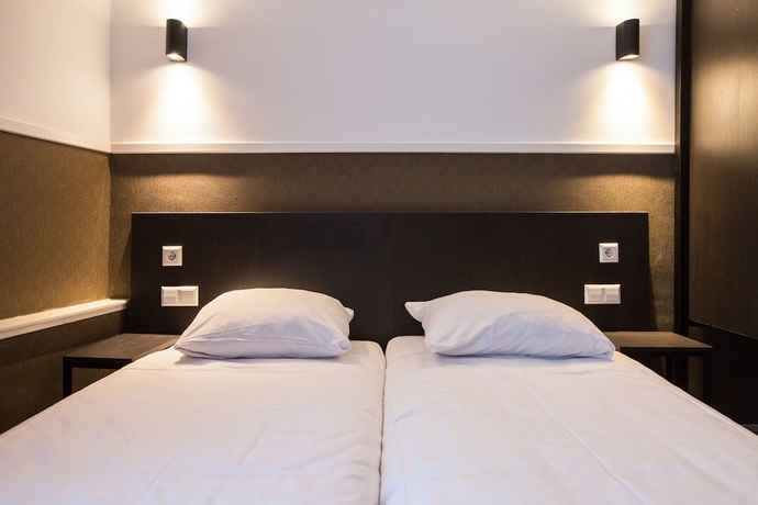 Imagen de la habitación del Hotel Manofa. Foto 15