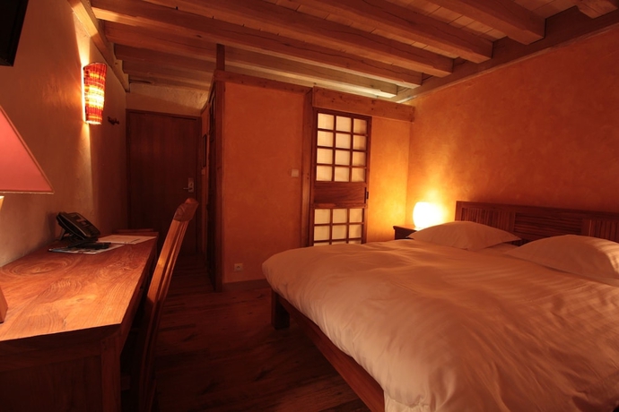 Imagen de la habitación del Hotel Manoir Des Indes, The Originals Relais (relais Du Silence). Foto 4