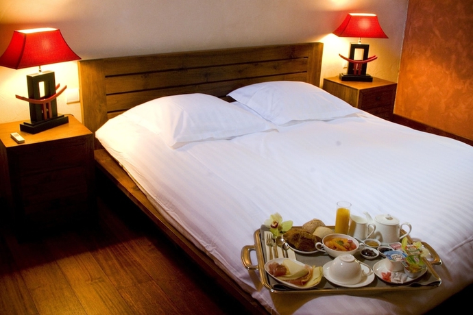 Imagen de la habitación del Hotel Manoir Des Indes, The Originals Relais (relais Du Silence). Foto 7