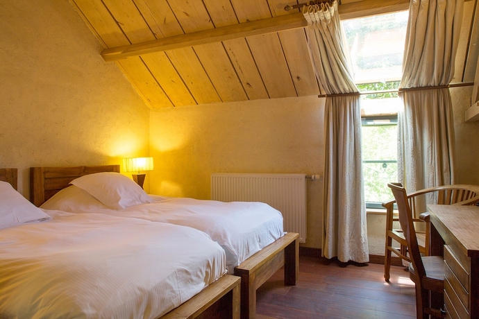 Imagen de la habitación del Hotel Manoir Des Indes, The Originals Relais (relais Du Silence). Foto 11