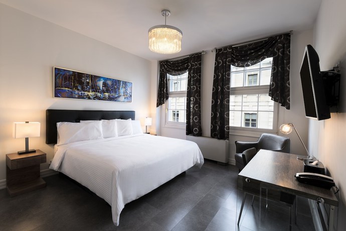 Imagen de la habitación del Hotel Manoir Morgan. Foto 12