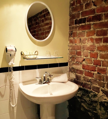 Imagen de la habitación del Hotel Manoir Sherbrooke. Foto 3