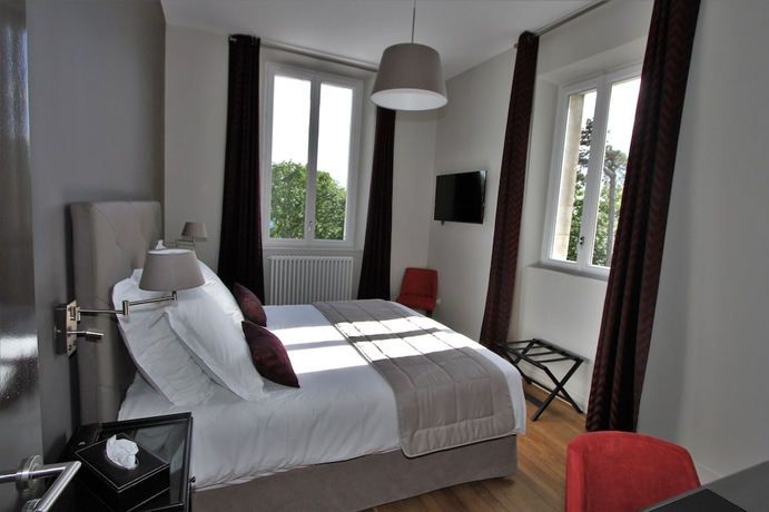 Imagen de la habitación del Hotel Manoir de Montigny. Foto 12