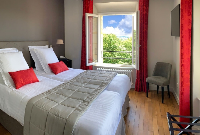 Imagen de la habitación del Hotel Manoir de Montigny. Foto 13