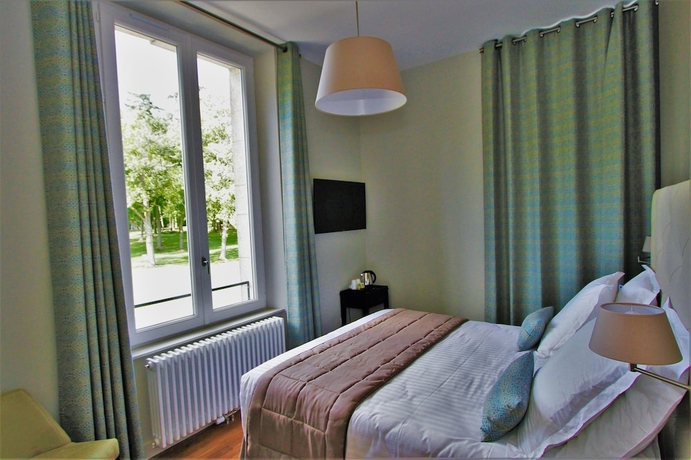 Imagen de la habitación del Hotel Manoir de Montigny. Foto 18