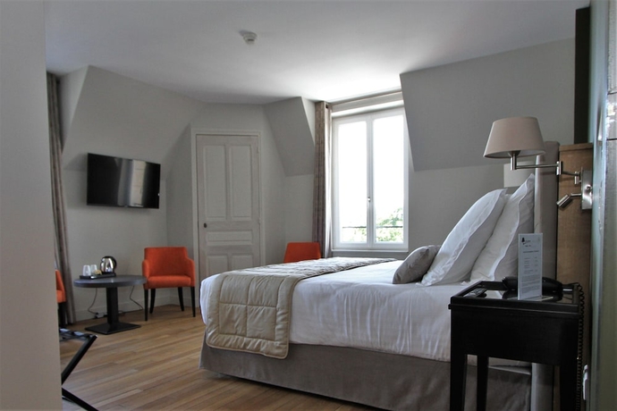 Imagen de la habitación del Hotel Manoir de Montigny. Foto 19