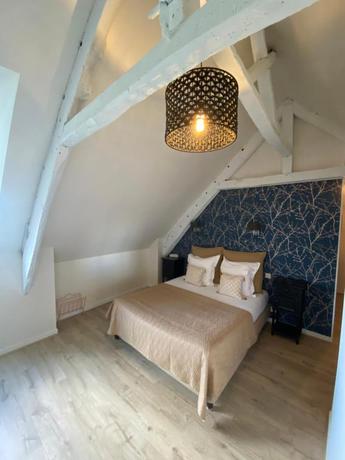 Imagen de la habitación del Hotel Manoir de Rigourdaine. Foto 5