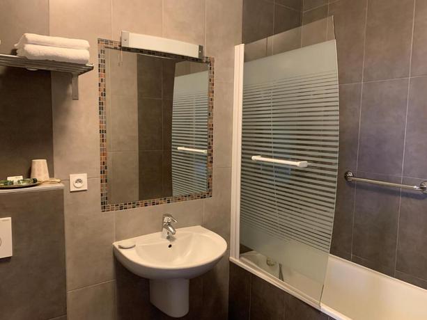 Imagen de la habitación del Hotel Manoir de Rigourdaine. Foto 12