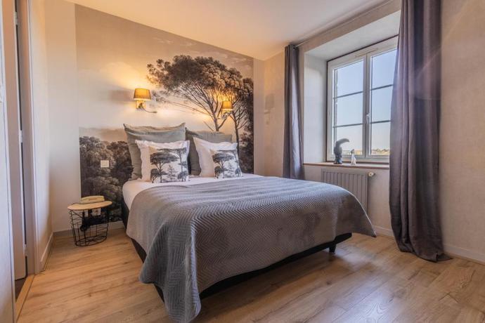 Imagen de la habitación del Hotel Manoir de Rigourdaine. Foto 14