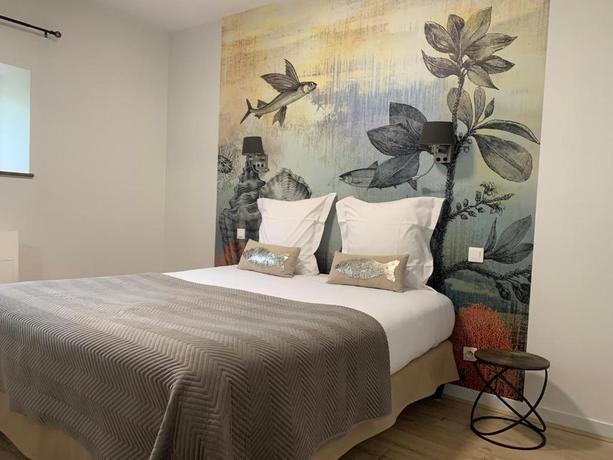 Imagen de la habitación del Hotel Manoir de Rigourdaine. Foto 16