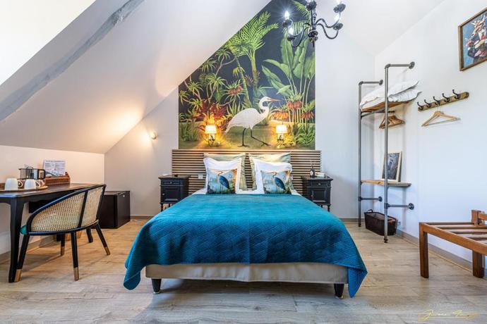 Imagen de la habitación del Hotel Manoir de Rigourdaine. Foto 17