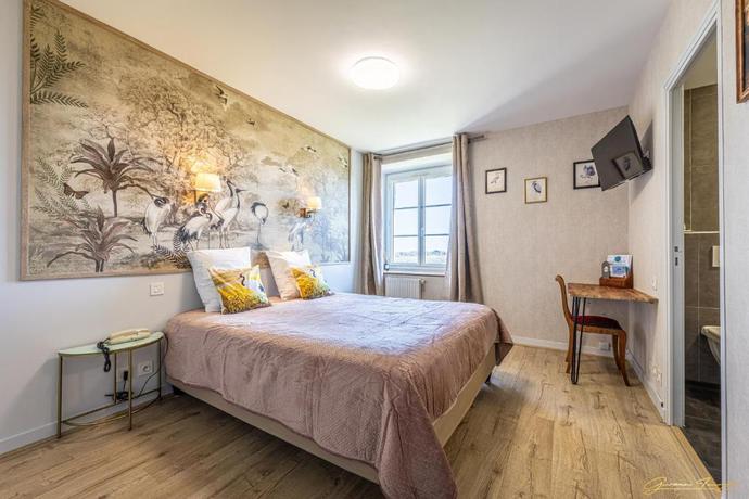 Imagen de la habitación del Hotel Manoir de Rigourdaine. Foto 18