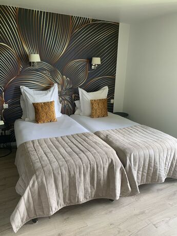 Imagen de la habitación del Hotel Manoir de Rigourdaine. Foto 11