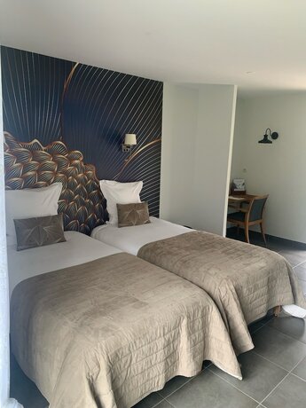 Imagen de la habitación del Hotel Manoir de Rigourdaine. Foto 13