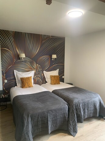 Imagen de la habitación del Hotel Manoir de Rigourdaine. Foto 18