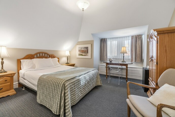 Imagen de la habitación del Hotel Manoir de la Tour. Foto 20