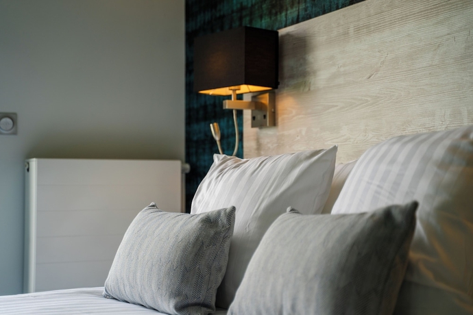 Imagen de la habitación del Hotel Manoir du Roselier. Foto 3