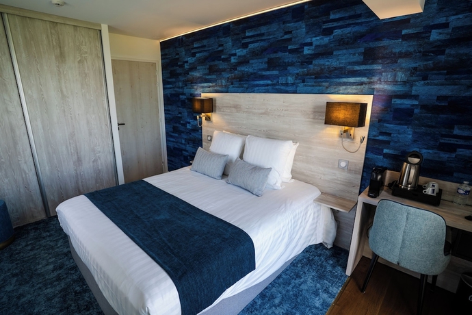 Imagen de la habitación del Hotel Manoir du Roselier. Foto 5