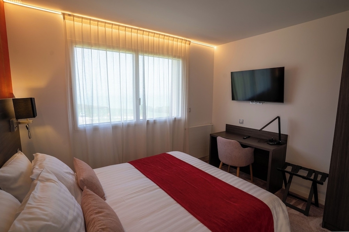 Imagen de la habitación del Hotel Manoir du Roselier. Foto 9