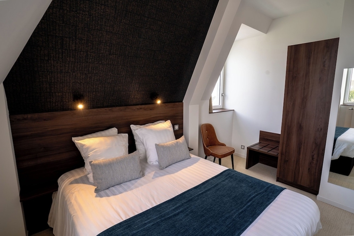 Imagen de la habitación del Hotel Manoir du Roselier. Foto 13