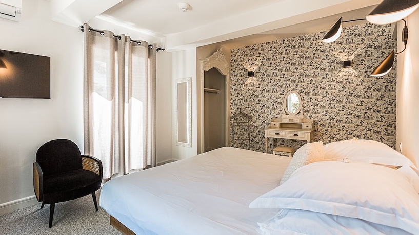 Imagen de la habitación del Hotel Manoir le Roure. Foto 5