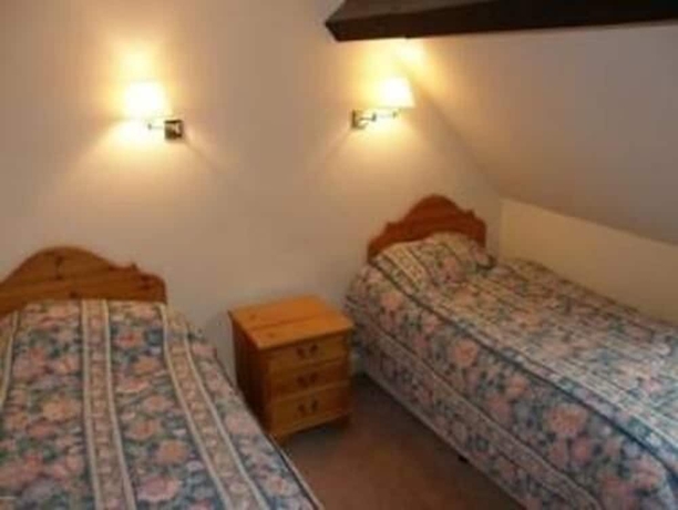 Imagen de la habitación del Hotel Manor Court Club. Foto 7