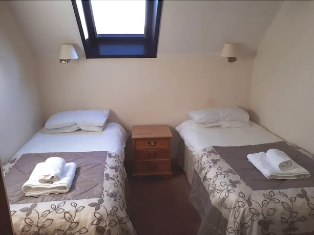 Imagen de la habitación del Hotel Manor Court Club. Foto 16