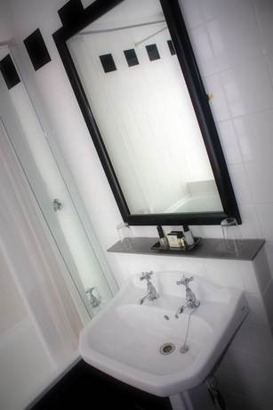 Imagen de la habitación del Hotel Manor House, West Auckland. Foto 8