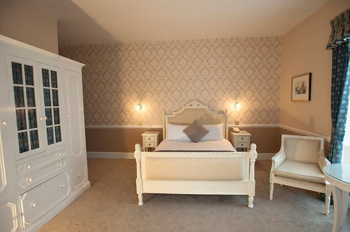 Imagen de la habitación del Hotel Manor of Groves. Foto 4
