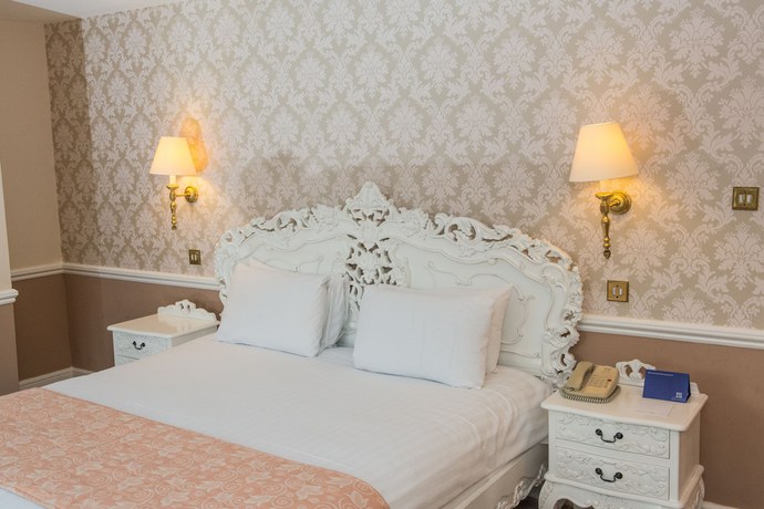 Imagen de la habitación del Hotel Manor of Groves. Foto 5