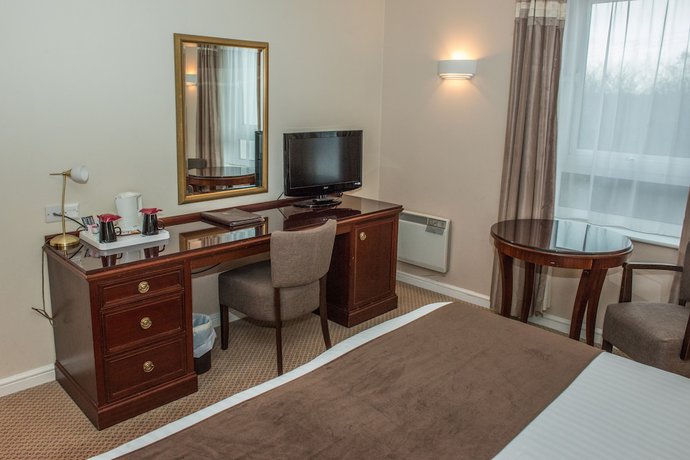 Imagen de la habitación del Hotel Manor of Groves. Foto 17